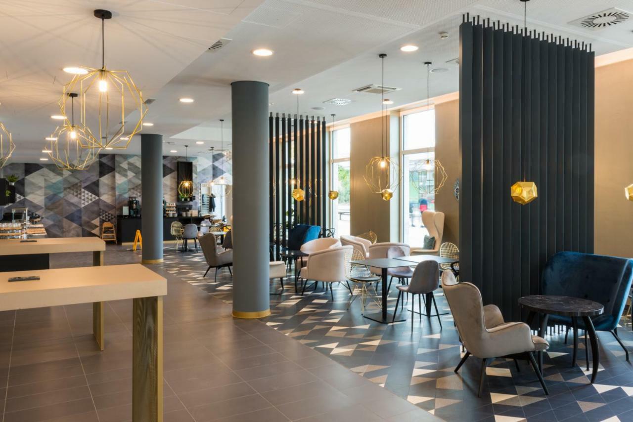 Holiday Inn - The Niu, Ridge Halle Central Station By Ihg Exterior foto